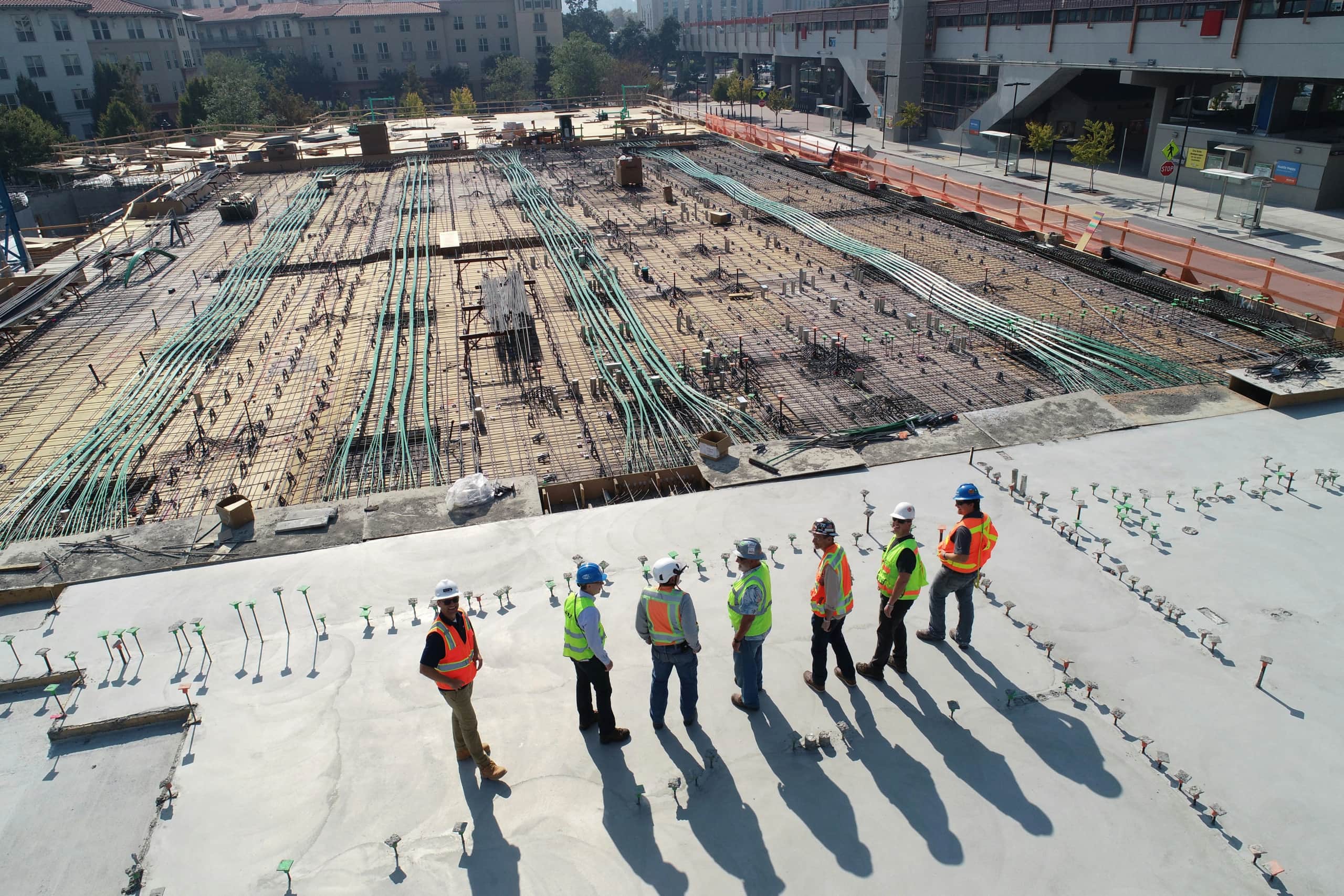Luxury hospitality development under construction at sunset
